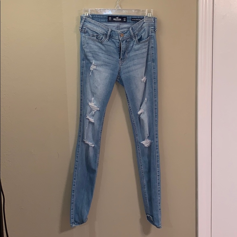 Light blue ripped jeans